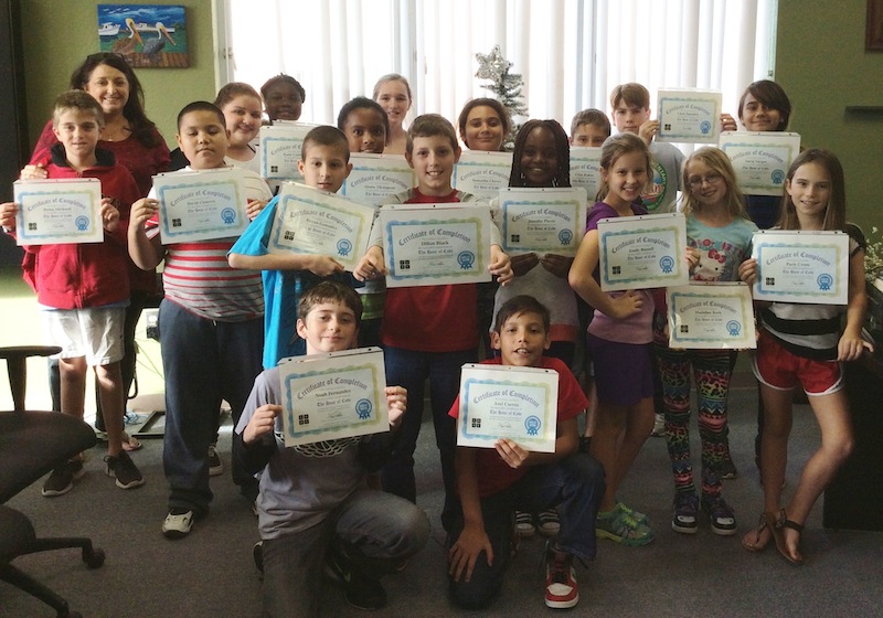 Mrs. Albury’s 5th grade class proudly displaying their coding certification.