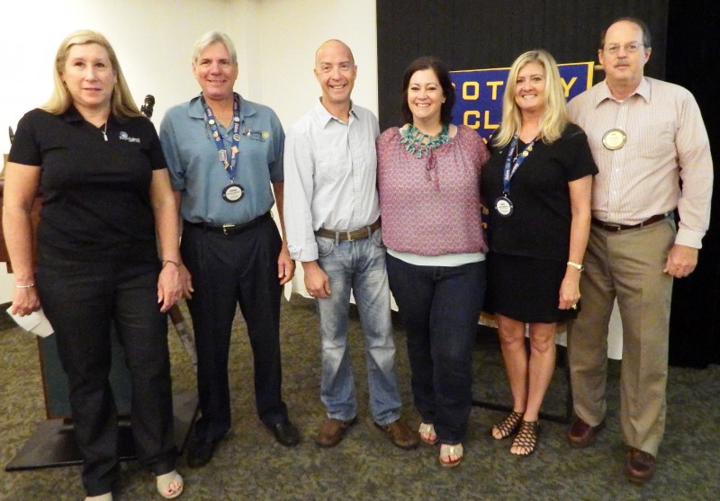 Pictured left to right: Membership Committee Chair Sue Fowler, sponsor George Wallace, new members Brian and Julie Doe, sponsor Julie Wallace and President Ron Demes.