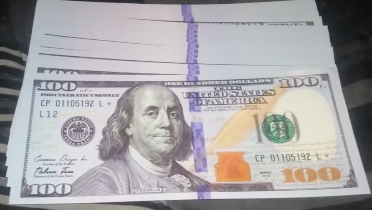 FAKE OR REAL? Hundred Dollar Bills Found All Over Town [video]