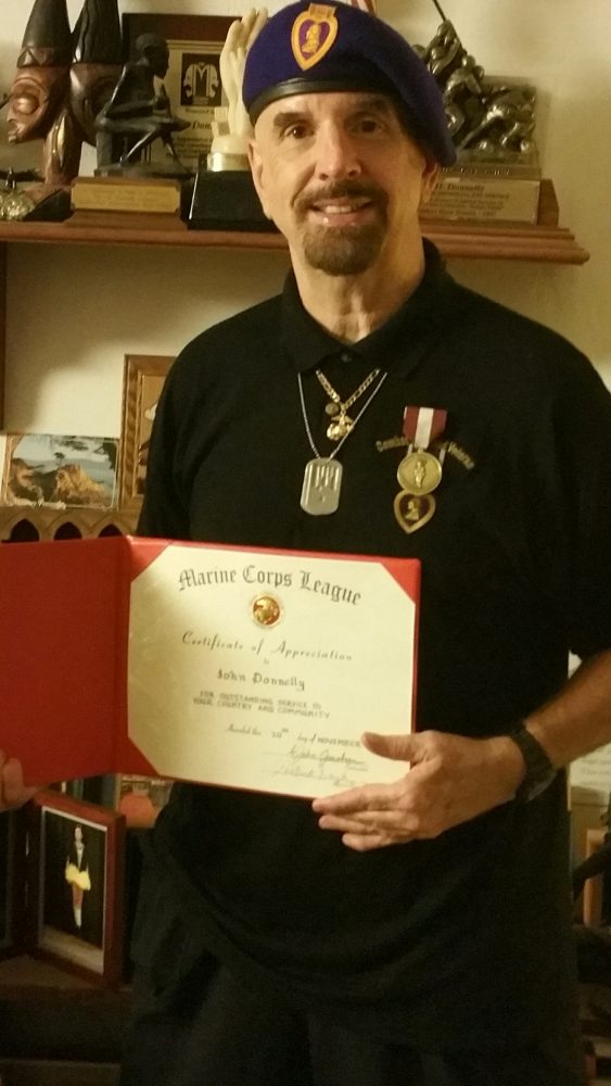 john-donnelly-with-marine-corp-award